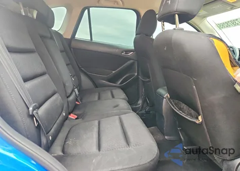 2013 Mazda Cx-5 Touring z USA, uszkodzony, nr VIN JM3KE2CE9D0118607